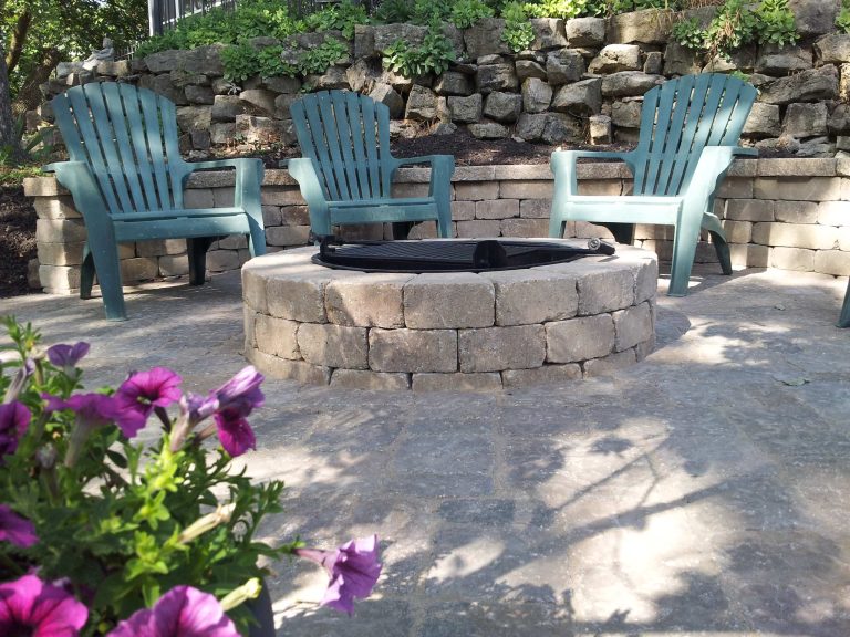 fire feature, retaining wall, annual flower pots, existing stone wall