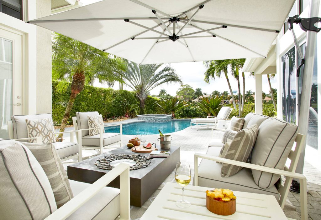 Frenchmen's Club Mod by Krista Watterworth Design Studio in Palm Beach Gardens, Florida. Photography by Mark Roskams. This outdoor space was tired and dated. We brought it into the present with modern luxuries, and an open, contemporary feel.