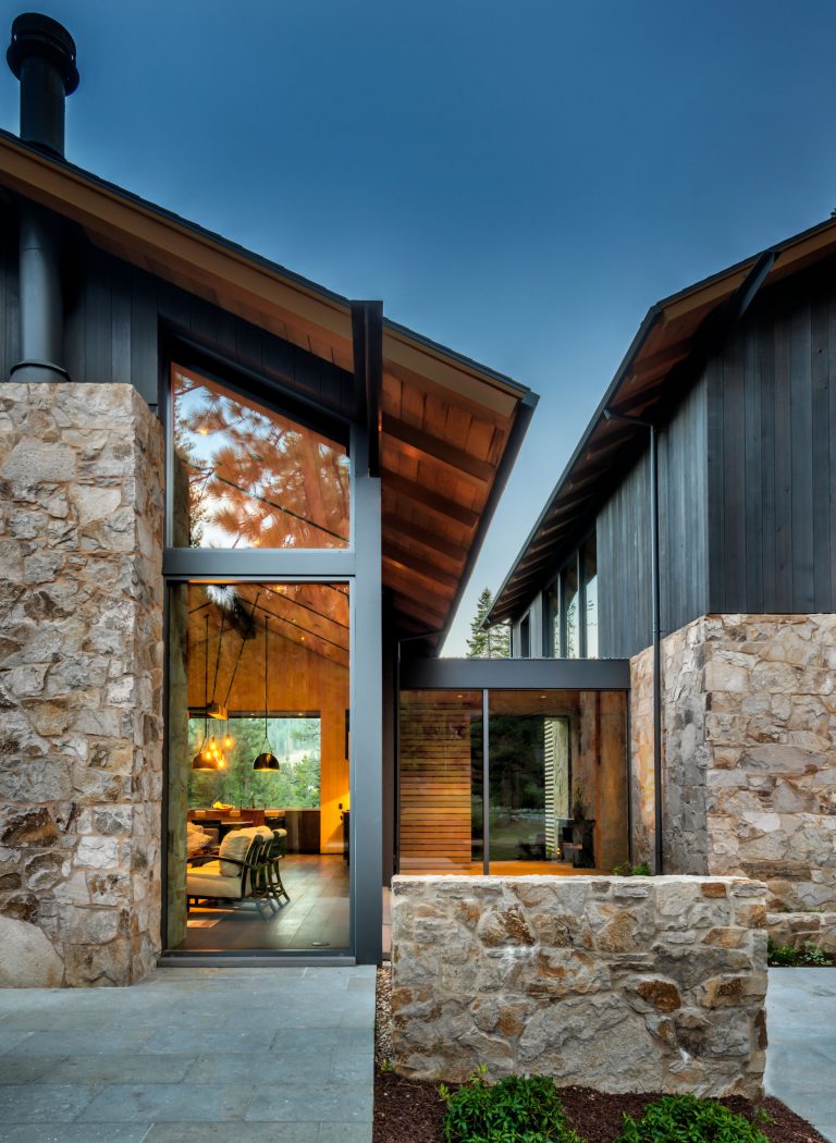 Patio - large rustic backyard stone patio idea in Sacramento with a fire pit and no cover