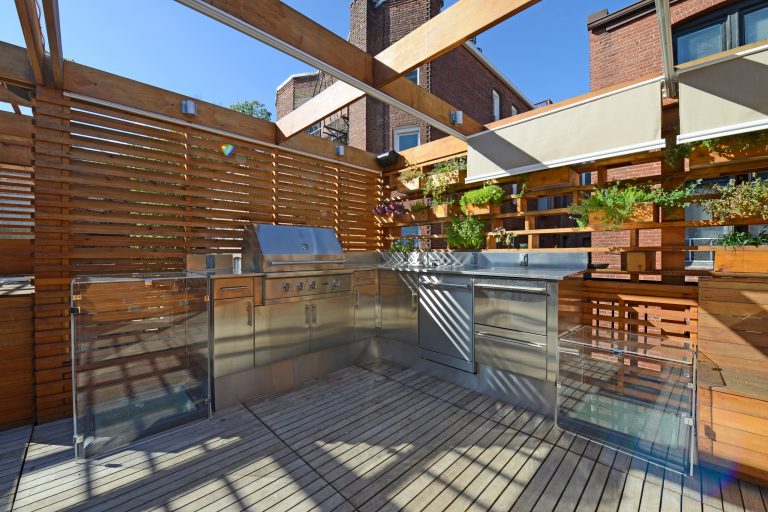 http://www.architextual.com/built-work#/2013-11/

A view of the outdoor kitchen which includes a gas grill, sink and outdoor dishwasher.

Photography:
michael k. wilkinson by ARCHI-TEXTUAL, PLLC | Outdoor Kitchens | Backyard Design | Outdoor Living Spaces | Landscape Design
