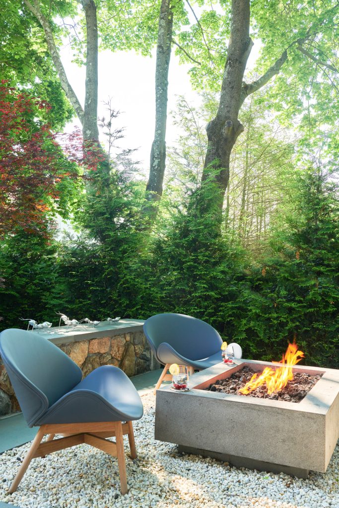 Patio - coastal gravel patio idea in New York with a fire pit and no cover
