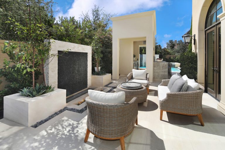 Inspiration for a transitional patio remodel in Orange County with a fire pit and no cover