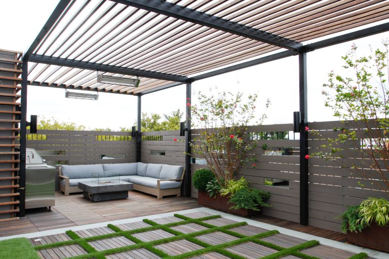 This is an example of a contemporary backyard landscaping in New York with a fire pit and decking.