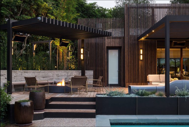 Trendy deck photo in San Francisco with a fire pit and a pergola