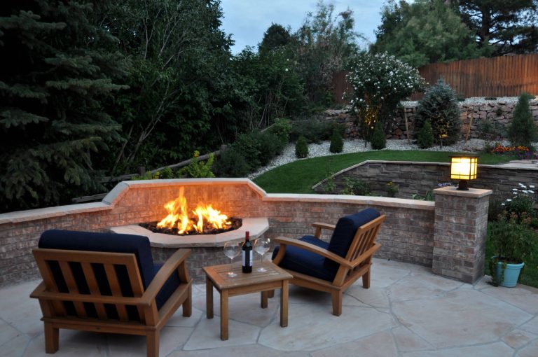 This Firepit, constructed in 2010 is built into the "bench wall" . Fire Pits need careful placement - they can take up a large area on a patio. By building this firepit into the wall, more valuable space is made for the rest of the patio.

Browne and Associates Custom Landscapes. by Browne and Associates Custom Landscapes | Fire Pits|Backyard Design|Outdoor Living Spaces|Landscape Design|Backyard Ideas|Landscaping|Landscaping Ideas|Landscape Installation|Fire Feautures|Fire Pit