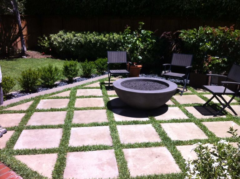 We created a custom paver design and included a gas fire pit.
