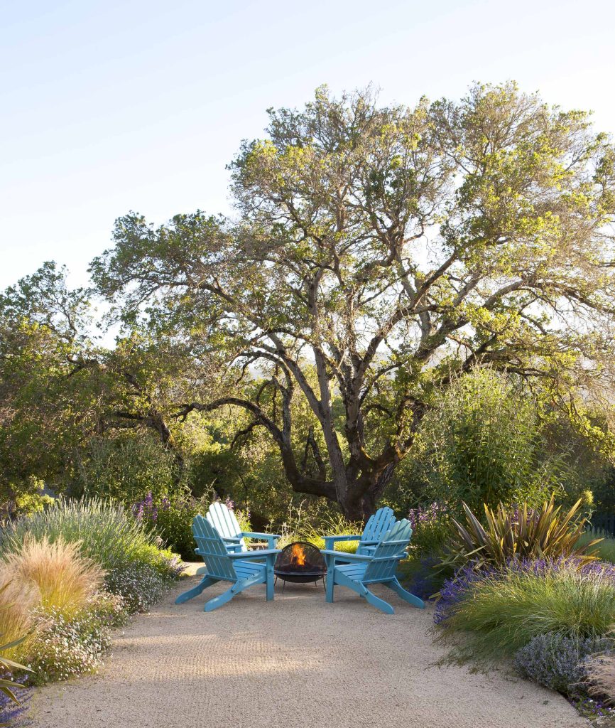 Taking inspiration from the agrarian site and a rustic architectural vernacular this terraced hillside garden evolved in response to time and place. The design vision was to celebrate the site, preserve the oak trees, accentuate views and create opportunities for modern day recreation and play. Michele Lee Willson Phototgraphy
