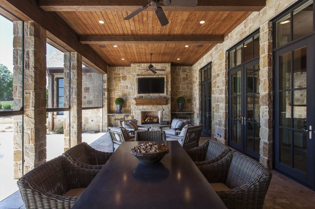Mountain style porch idea in Dallas with a roof extension and a fire pit by Simmons Estate Homes | Outdoor Photos | Porch | Landscaping | Landscape Design | Outdoor Living Space | Porch Design Ideas | Outdoor Living Space Ideas | Backyard Design