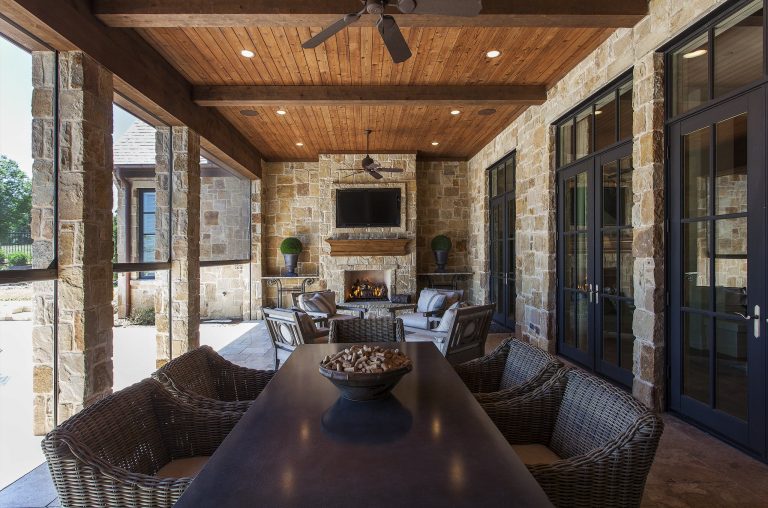 Mountain style porch idea in Dallas with a roof extension and a fire pit by Simmons Estate Homes | Outdoor Photos | Porch | Landscaping | Landscape Design | Outdoor Living Space | Porch Design Ideas | Outdoor Living Space Ideas | Backyard Design