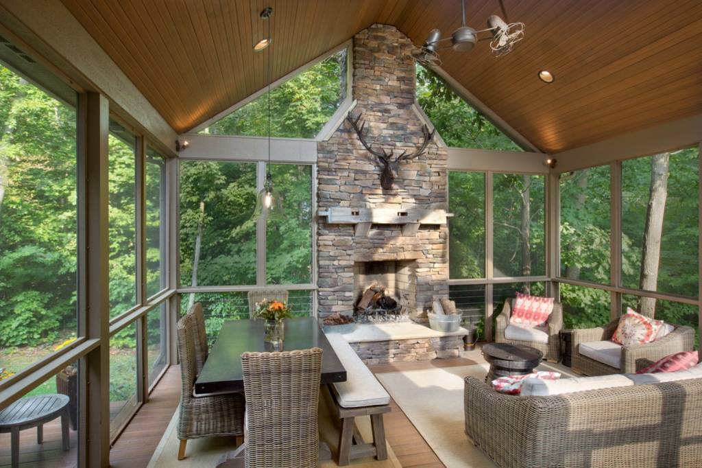 Classic porch idea in Columbus with a fire pit, decking and a roof extension by Finish Line Building | Outdoor Photos | Porch | Landscaping | Landscape Design | Outdoor Living Space | Porch Design Ideas | Outdoor Living Space Ideas | Backyard Design