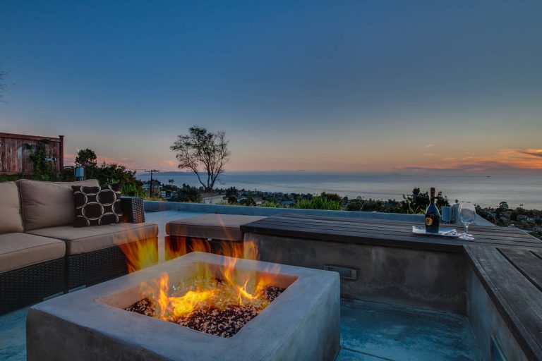 Inspiration for a coastal backyard patio remodel in Los Angeles with a fire pit