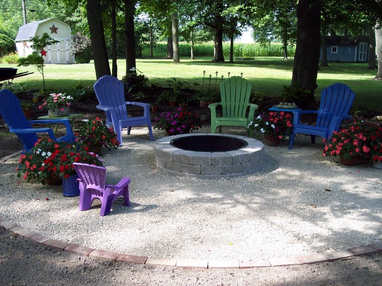 Wood burning Fire Pit surrounded by Royal Brassfield crushed stone. Two sizes of the crushed stone were spread and then compacted for a more solid surface.