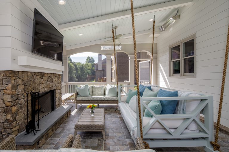 Inspiration for a mid-sized transitional tile back porch remodel in Atlanta with a fire pit and a roof extension by Southland Development Services | Outdoor Photos | Porch | Landscaping | Landscape Design | Outdoor Living Space | Porch Design Ideas | Outdoor Living Space Ideas | Backyard Design
