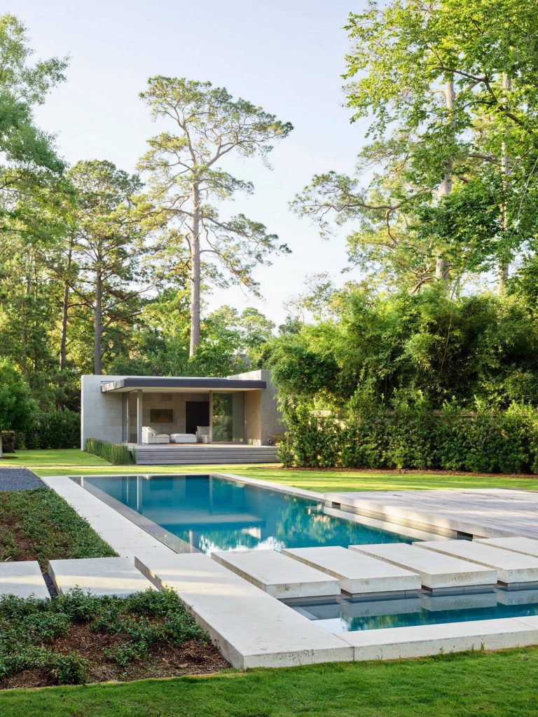 The separate guest/pool house has its own deck and secluded garden.

©Matthew MillmanPool - mid-sized modern backyard rectangular and concrete lap pool idea in Houston by Ehrlich Yanai Rhee Chaney Architects | Pool design | Pool Contracting | Swimming Pool Ideas | Swimming Pool Design Ideas
