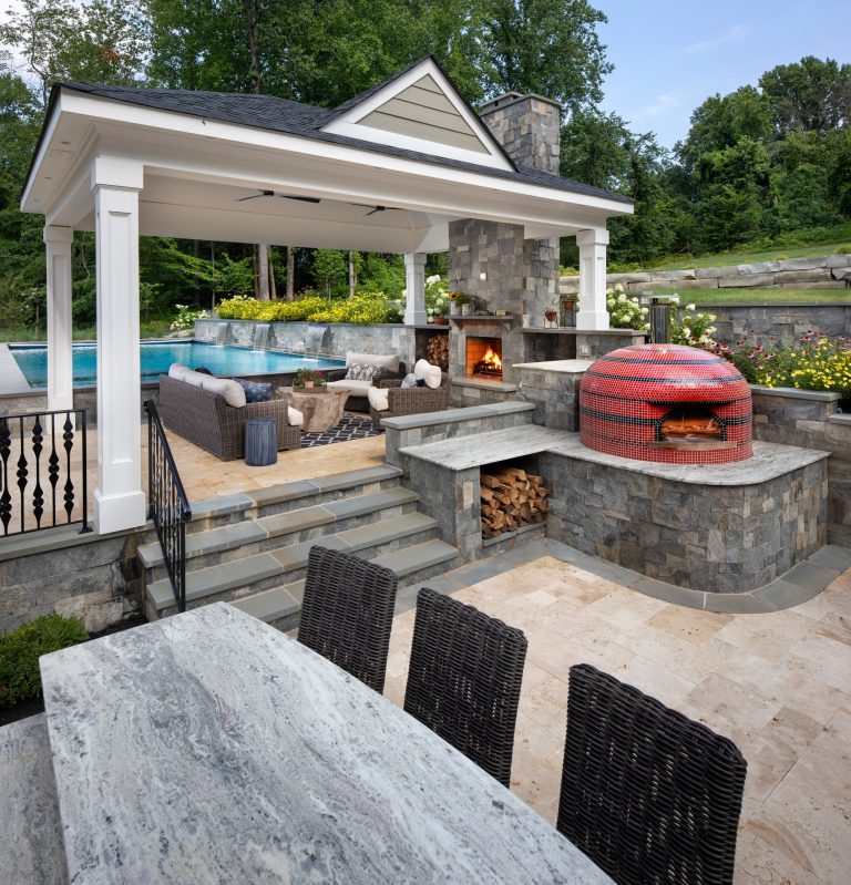 pool house pizza oven, bar, fireplace, pool, retaining walls, pergola.