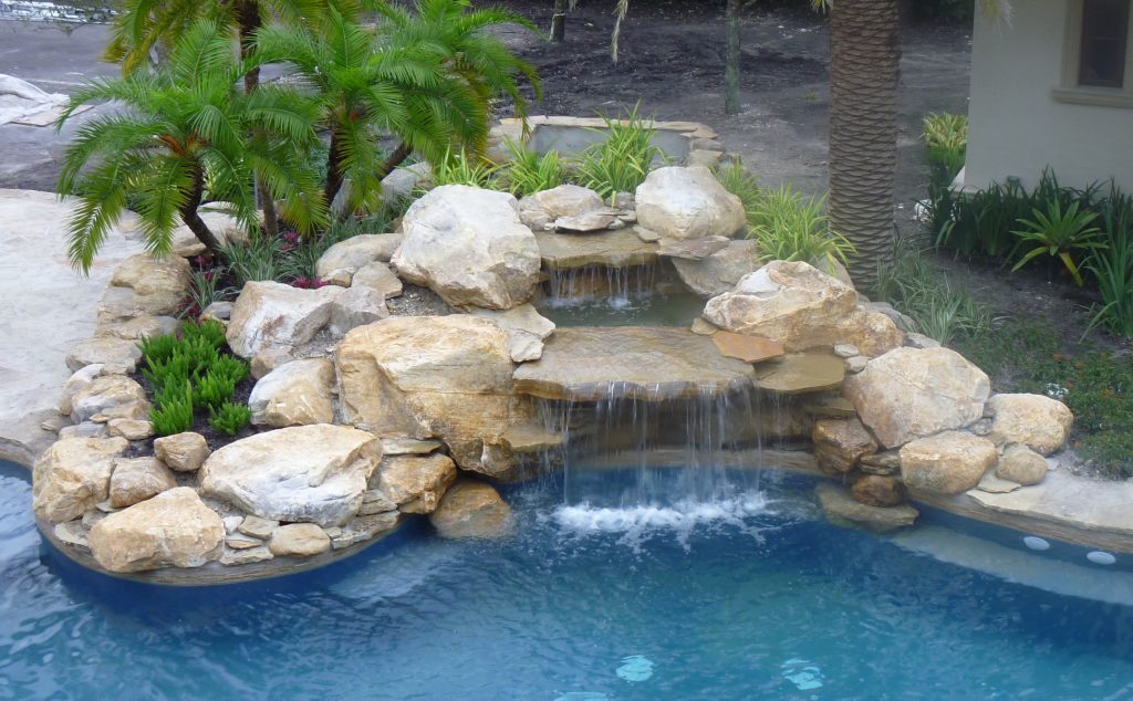 pool waterfalls by Matthew Giampietro in Miami, Florida