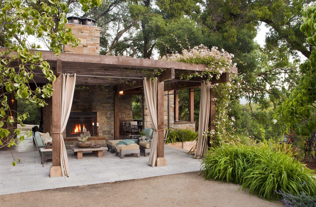 Taking inspiration from the agrarian site and a rustic architectural vernacular this terraced hillside garden evolved in response to time and place. The design vision was to celebrate the site, preserve the oak trees, accentuate views and create opportunities for modern day recreation and play. Michele Lee Willson Phototgraphy