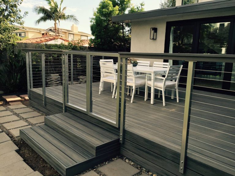 powder coated stainless steel post with a 2x4 cedar top rail and a 1x6 trex cap