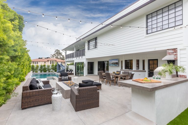 Patio - transitional patio idea in San Diego with a fire pit and no cover