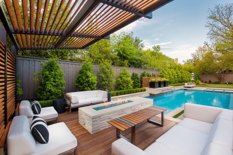 Deck - mid-sized contemporary backyard deck idea in Dallas with a fire pit and a pergola