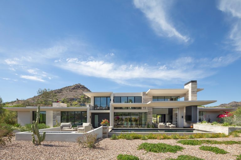 The four-bedroom custom residence is filled with an abundance of light, yet is perfectly sited to manage the harsh desert sun.

Project Details // Razor's Edge
Paradise Valley, Arizona
Architecture: Drewett Works
Builder: Bedbrock Developers
Interior design: Holly Wright Design
Landscape: Bedbrock Developers
Photography: Jeff Zaruba
Travertine walls: Cactus Stone

https://www.drewettworks.com/razors-edge/ by Drewett Works | Pool design | Pool Contracting | Swimming Pool Ideas | Swimming Pool Design Ideas