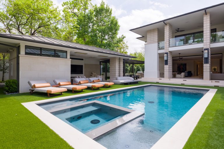 rear yard with pool and cabana