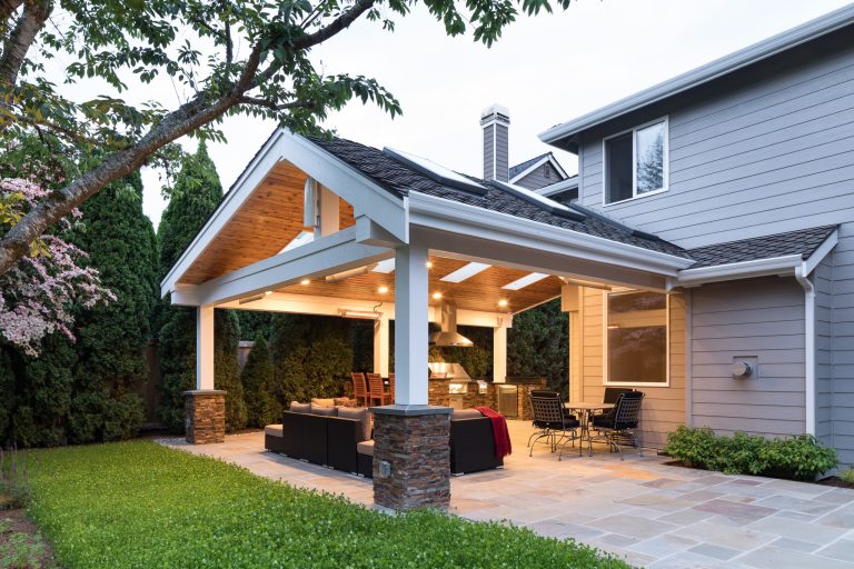 Our client wanted to create a fresh outdoor living space within their outdated backyard and to give a makeover to their entire property. The overall setting was a tremendous asset to the spaces - a large wetland area just behind their home, full of interesting birds and wildlife that the homeowner values.

We designed and built a spacious covered outdoor living space as the backyard focal point. The kitchen and bar area feature a Hestan grill, kegerator and refrigerator along with ample counter space. This structure is heated by Infratech heaters for maximum all-season use. An array of six skylights allows light into the space and the adjacent windows.

While the covered space is the focal point of the backyard, the entire property was redesigned to include a bluestone patio and pathway, dry creek bed, new planting, extensive low voltage outdoor lighting and a new entry monument.

The design fits seamlessly among the existing mature trees and the backdrop of a beautiful wetland area beyond. The structure feels as if it has always been a part of the home.


William Wright Photography by Urban Oasis Design & Construction LLC | Fire Pits|Backyard Design|Outdoor Living Spaces|Landscape Design|Backyard Ideas|Landscaping|Landscaping Ideas|Landscape Installation|Fire Feautures|Fire Pit