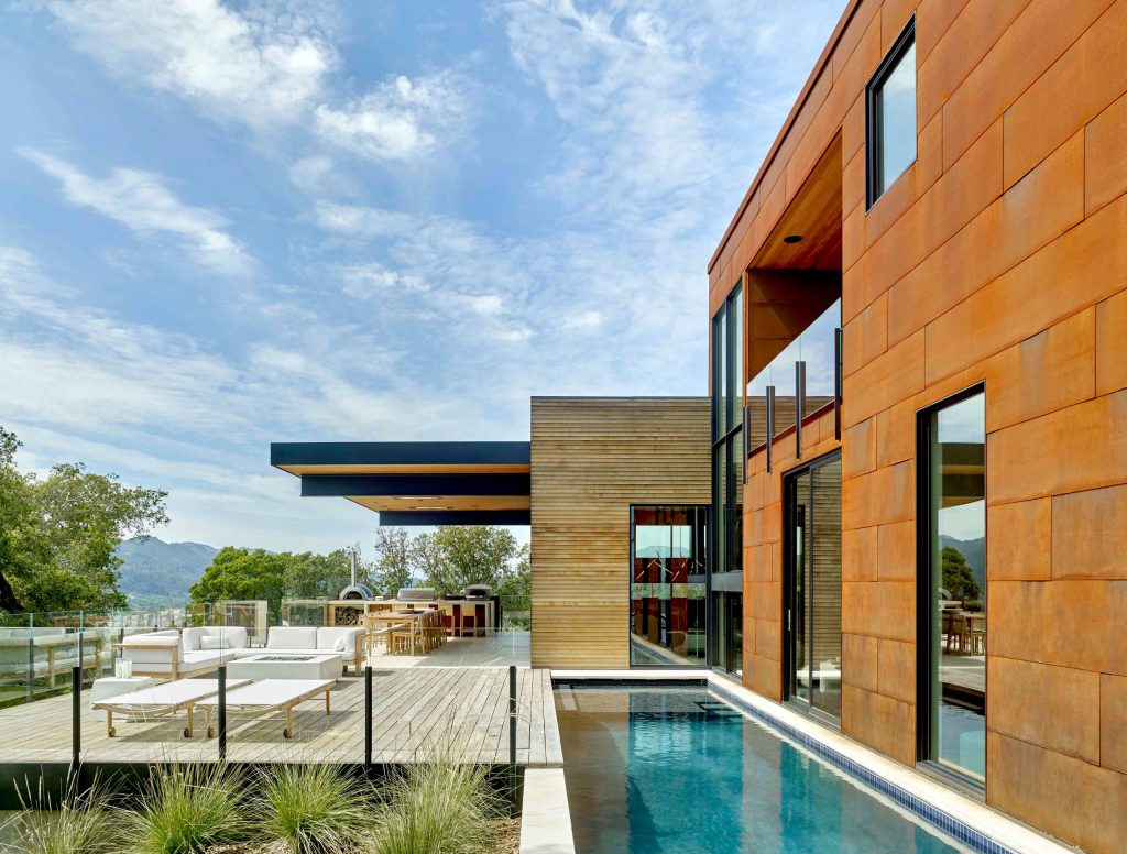 Example of a trendy backyard deck design in San Francisco with a fire pit and no cover