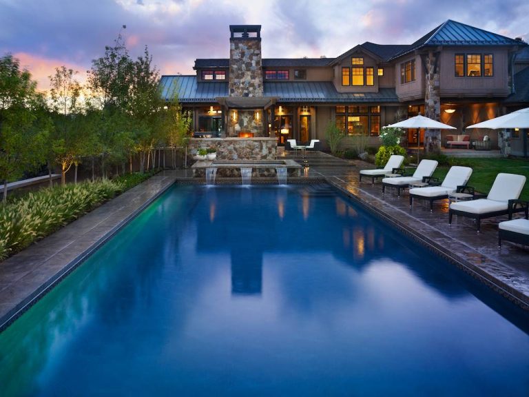 This elegant expression of a modern Colorado style home combines a rustic regional exterior with a refined contemporary interior. The client's private art collection is embraced by a combination of modern steel trusses, stonework and traditional timber beams. Generous expanses of glass allow for view corridors of the mountains to the west, open space wetlands towards the south and the adjacent horse pasture on the east.

Builder: Cadre General Contractors http://www.cadregc.com

Photograph: Ron Ruscio Photography http://ronrusciophotography.com/ by Ekman Design Studio | Pool design | Pool Contracting | Swimming Pool Ideas | Swimming Pool Design Ideas
