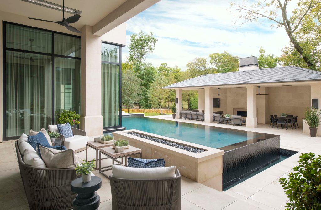 Rear Porch with view of pool and Pool House