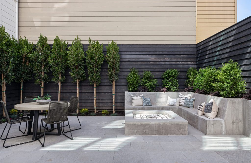 Patio - contemporary backyard concrete paver patio idea in San Francisco with a fire pit