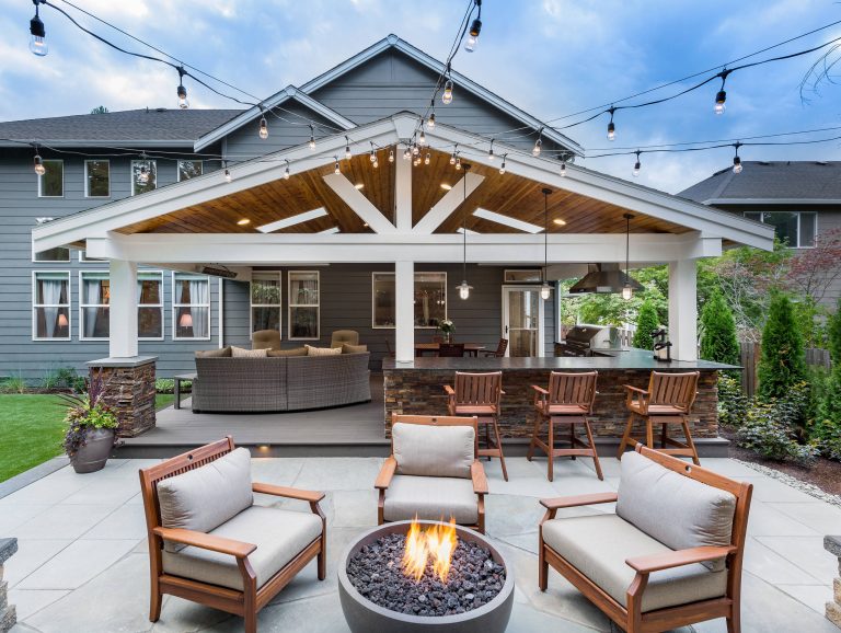 Inspiration for a large transitional backyard concrete patio remodel in Seattle with a fire pit and no cover
