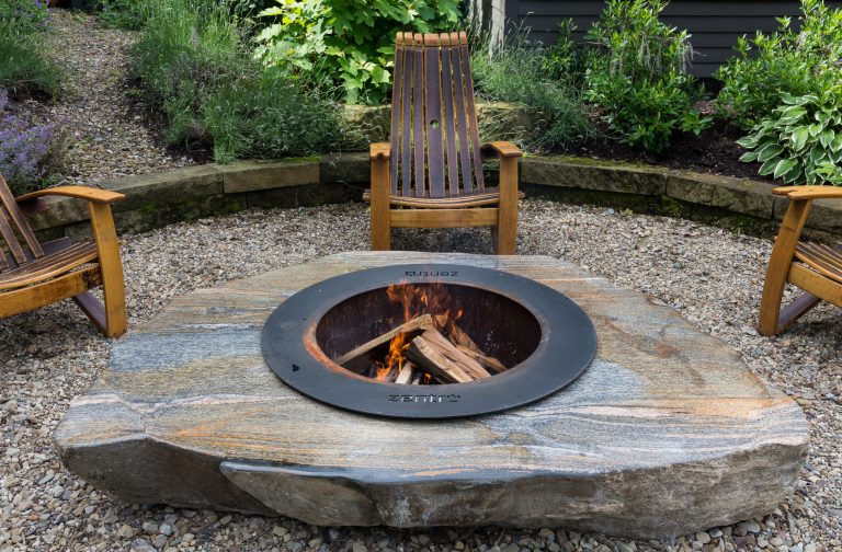 Patio - mid-sized traditional backyard gravel patio idea in Cleveland with a fire pit and no cover