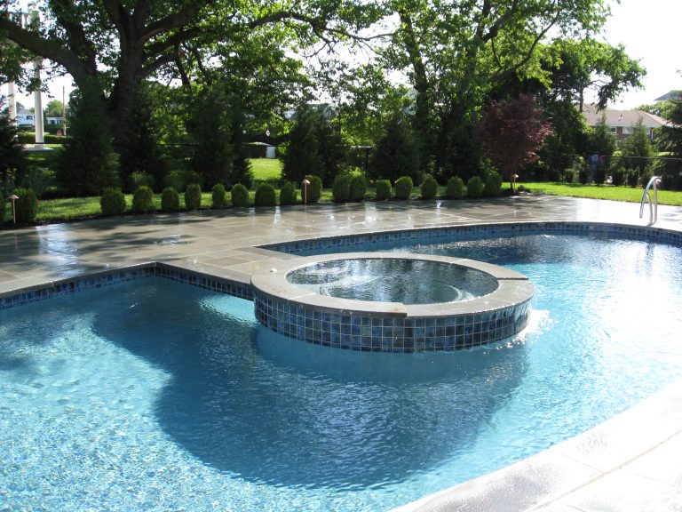 Custom built concrete pool/spa combo by All Island Group. NESPA Silver design award