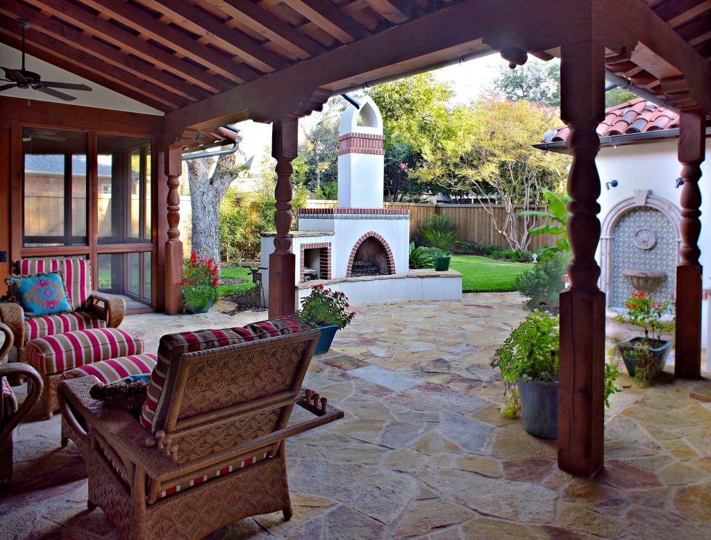 The outdoor living area off the back of the house reflects the Spanish Mediterranean theme and detail that the client desired!