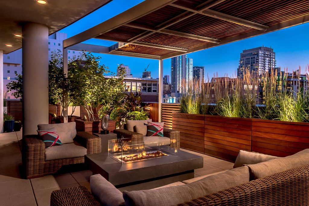 The city comes alive in the evening.

Photo courtesy Van Inwegen Digital ArtsDeck - mid-sized contemporary rooftop deck idea in Chicago with a fire pit by Chicago Specialty Gardens, Inc. | Fire Pits|Backyard Design|Outdoor Living Spaces|Landscape Design|Backyard Ideas|Landscaping|Landscaping Ideas|Landscape Installation|Fire Feautures|Fire Pit
