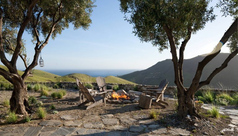 Rustic fire pit with an amazing view