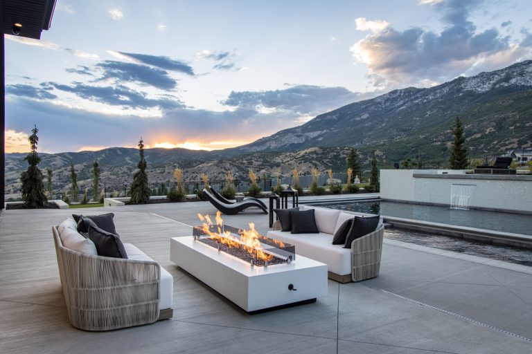Inspiration for a contemporary patio remodel in Salt Lake City with a fire pit and no cover