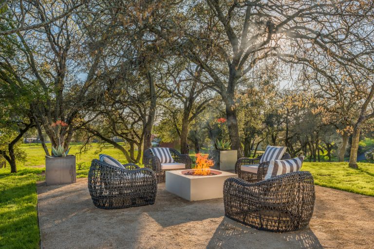Patio - farmhouse backyard gravel patio idea in San Francisco with a fire pit