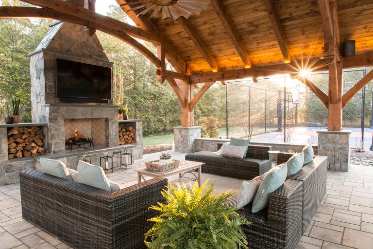 Example of a classic patio design in DC Metro with a fire pit and a gazebo