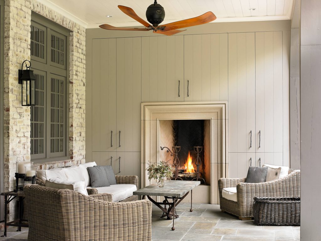 Elegant patio photo in Atlanta with a fire pit and a roof extension