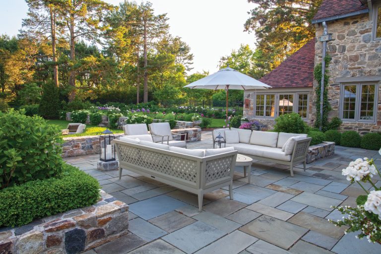 Example of a mid-sized arts and crafts backyard concrete paver patio design in New York with a fire pit and no cover