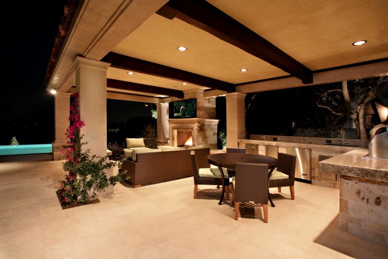 Tuscan patio photo in Los Angeles with a gazebo and a fire pit