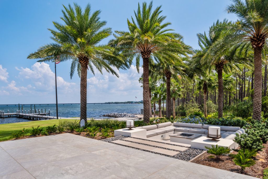 Island style patio photo in Other with no cover and a fire pit