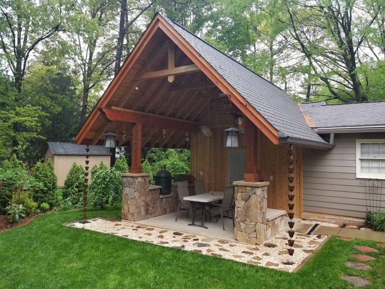 we added on a storage room to the back of an existing garage and created a outdoor covered patio/kitchen off of the storage area