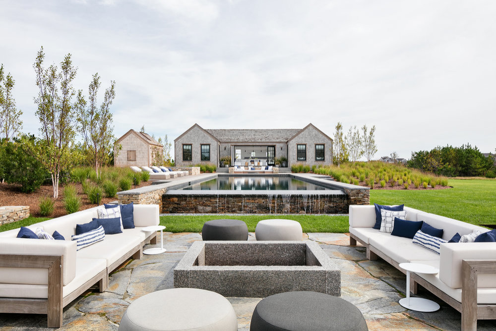 Patio - coastal stone patio idea in Boston with a fire pit and no cover