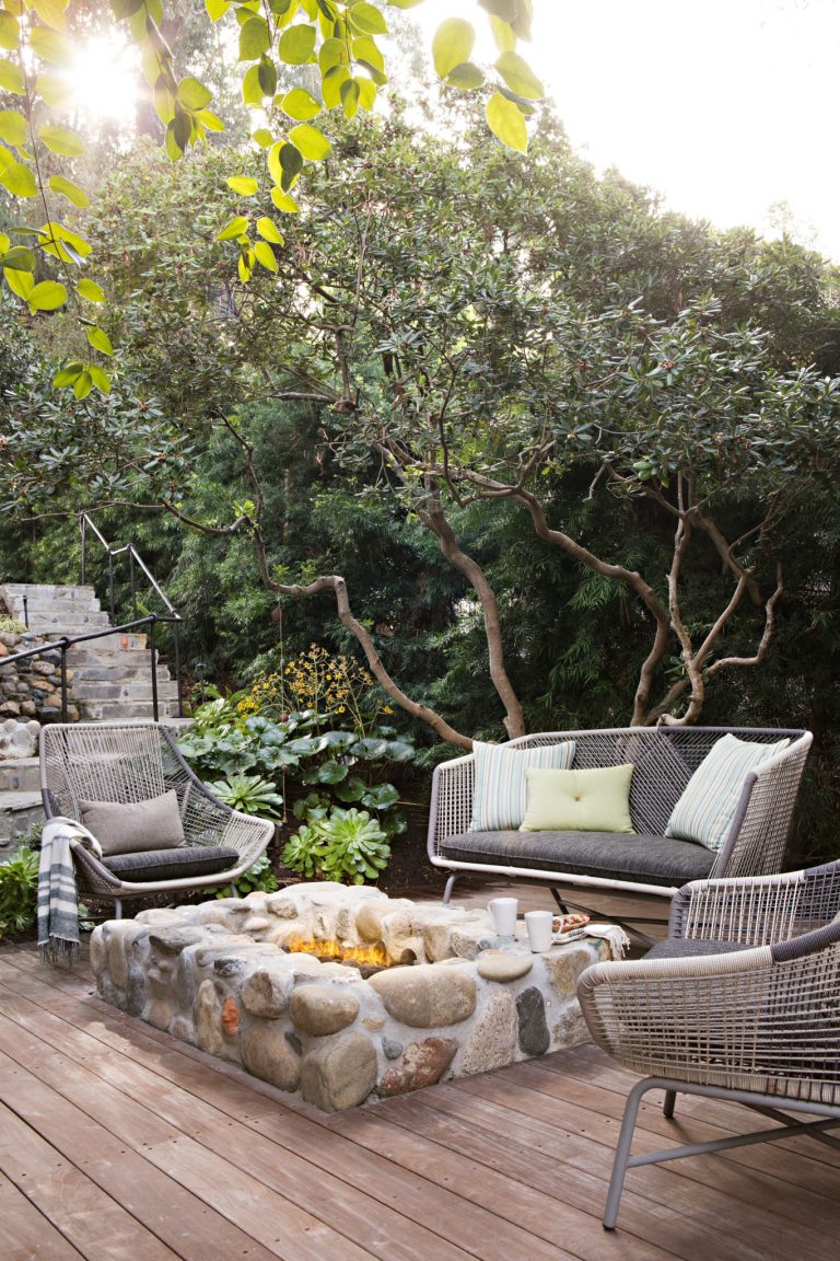 Inspiration for a coastal deck remodel in Orange County with a fire pit and no cover